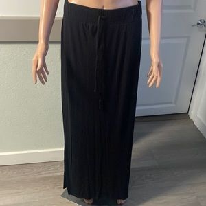 Long black skirt with binding in the belt